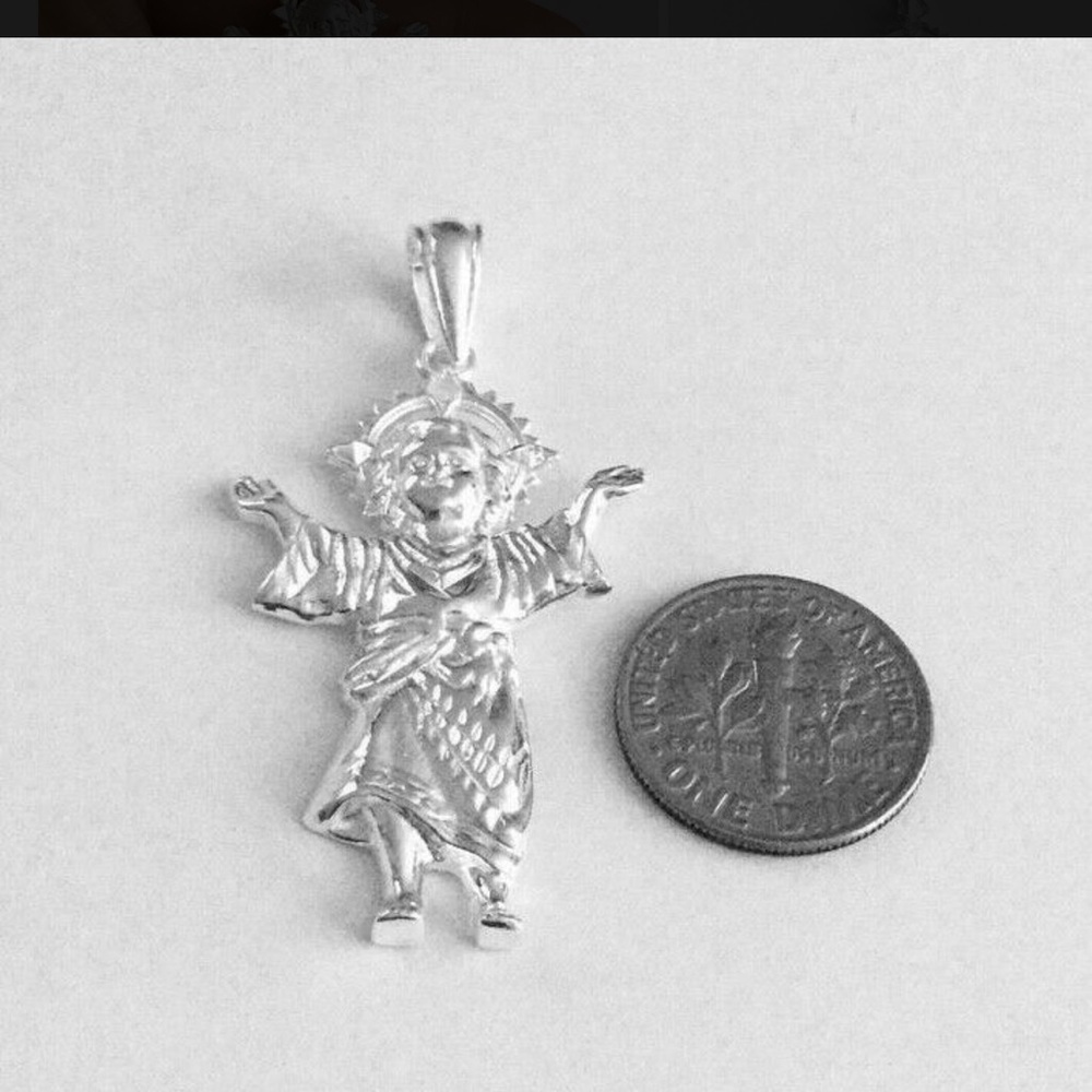 Sterling Silver Cherub Pendant with Intricate design details